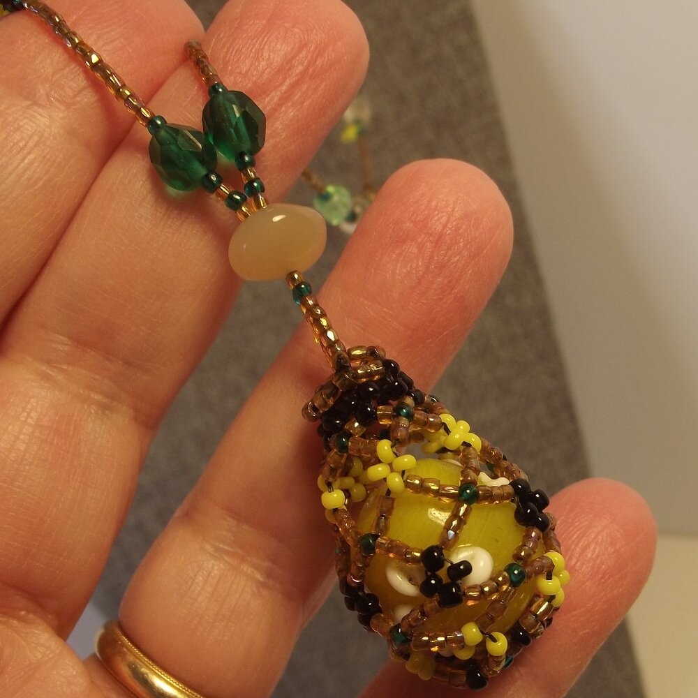 Lampwork Yellow Glass Bead in Crocheted "Cage" Pendant Necklace